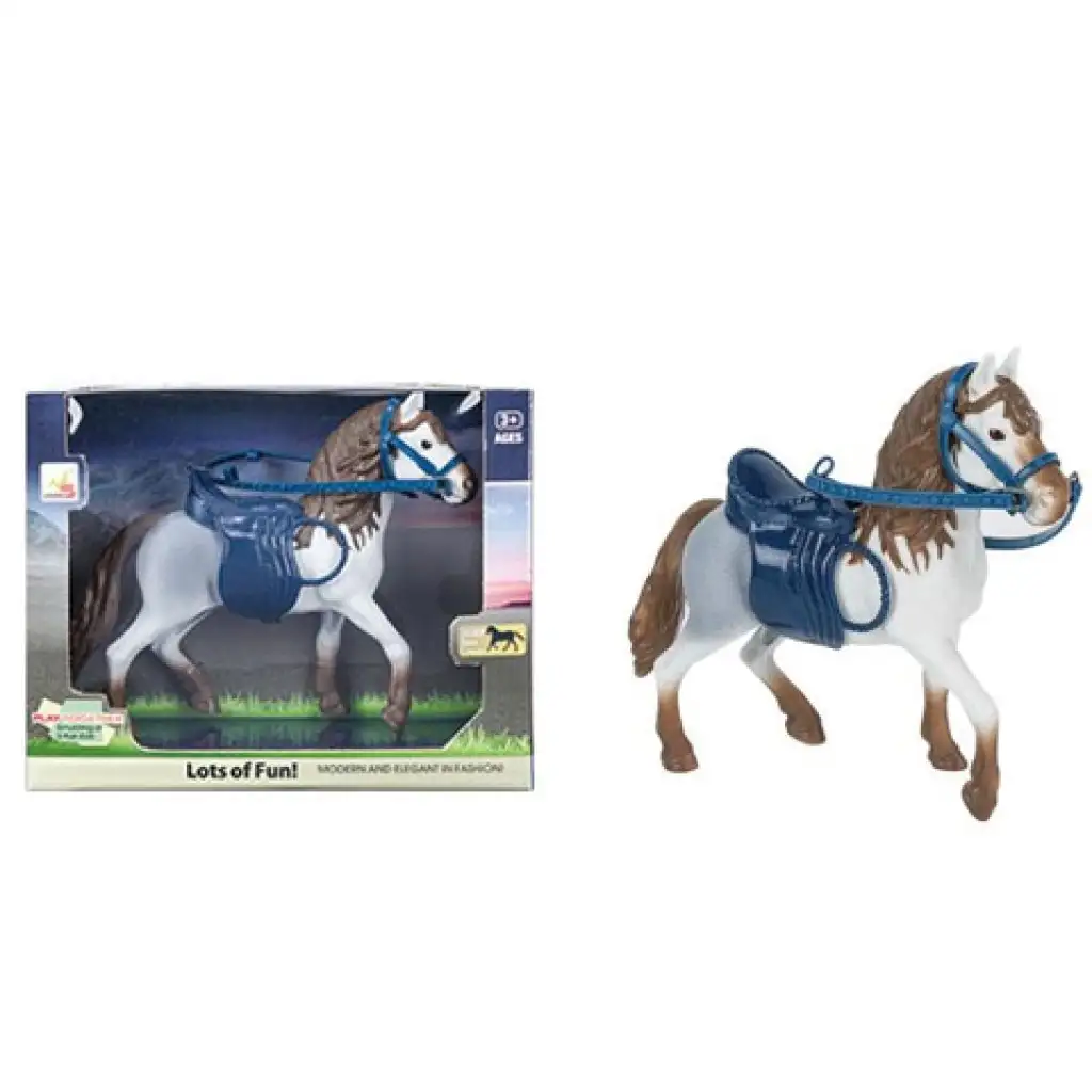 Weißes Pferd mit Sattel und Zaumzeug Bild 1
