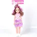 Baby im Kleid mit Herzchenmuster und melierter Frisur, 46 cm
