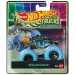 Hot Wheels Monster Trucks: Skelesaurus – im Dunkeln leuchtendes Miniaturauto 1/64 – Mattel