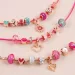 Make it Real: Kristall Medaillon Armbänder Pink