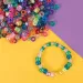 PlayBox: Buntes fädelbares Perlen-Set in Zylinderform und Würfel-ABC, 1000-teiliges Paket Bild 3