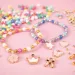PlayBox: Charm Armband Bastelset mit Perlen und Anhängern 500 Stück Bild 3